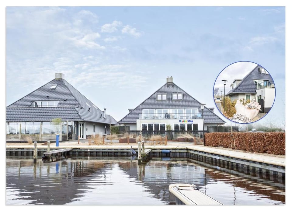 Spacious Water Apartment with Terrace & BBQ Garden in Offingawier Apartment in Friesland, Netherlands