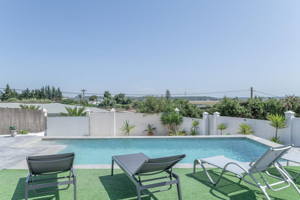 Property building, Living room, Swimming pool
