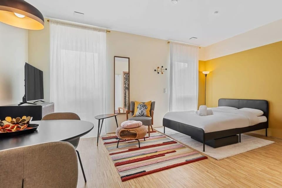 Bed, towels, wardrobe