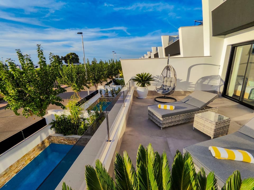 Patio, Balcony/Terrace, Seating area, Pool view, sunbed