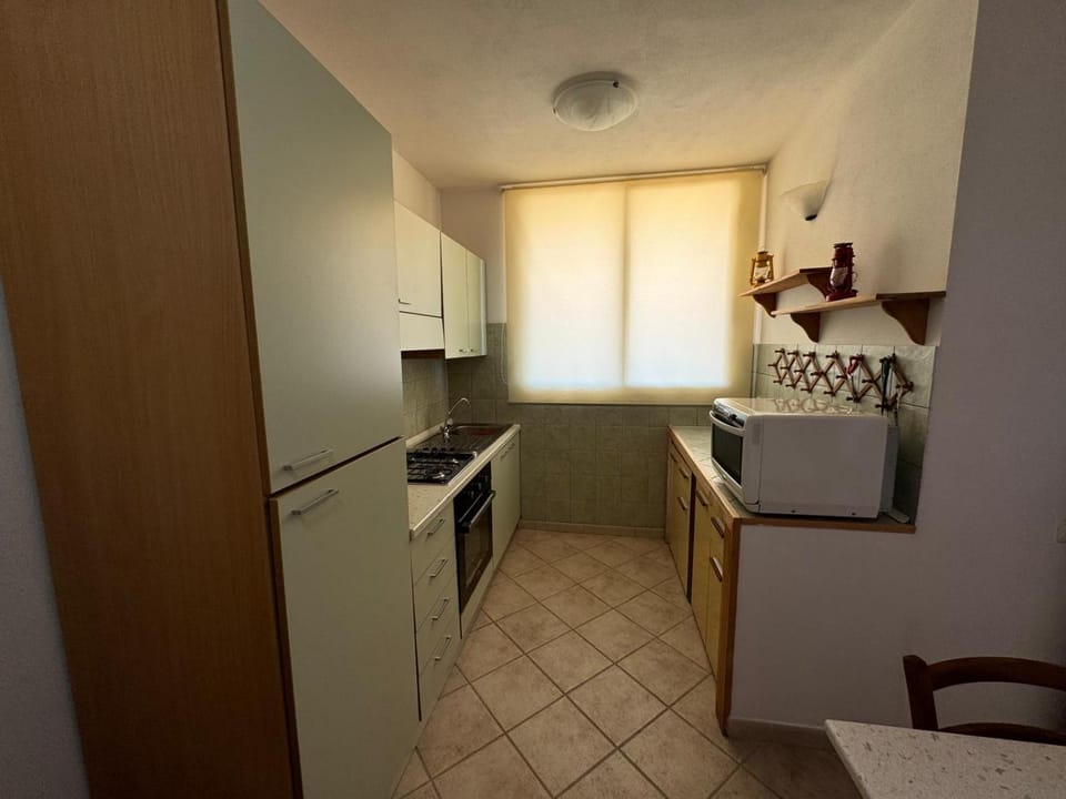 Kitchen or kitchenette, oven, stove