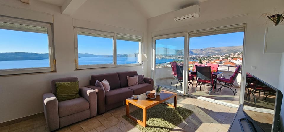 Natural landscape, Living room, Seating area, Dining area, Sea view