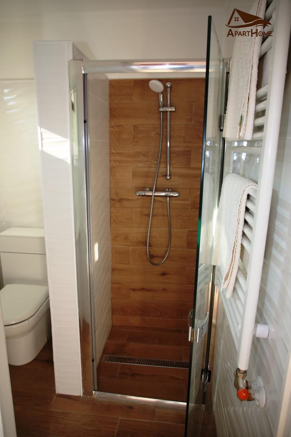 Shower, Toilet, Bathroom, hair dryier, towels