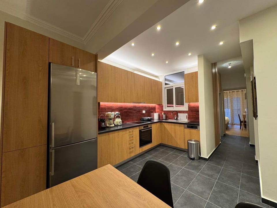Kitchen or kitchenette, dishwasher, oven, stove