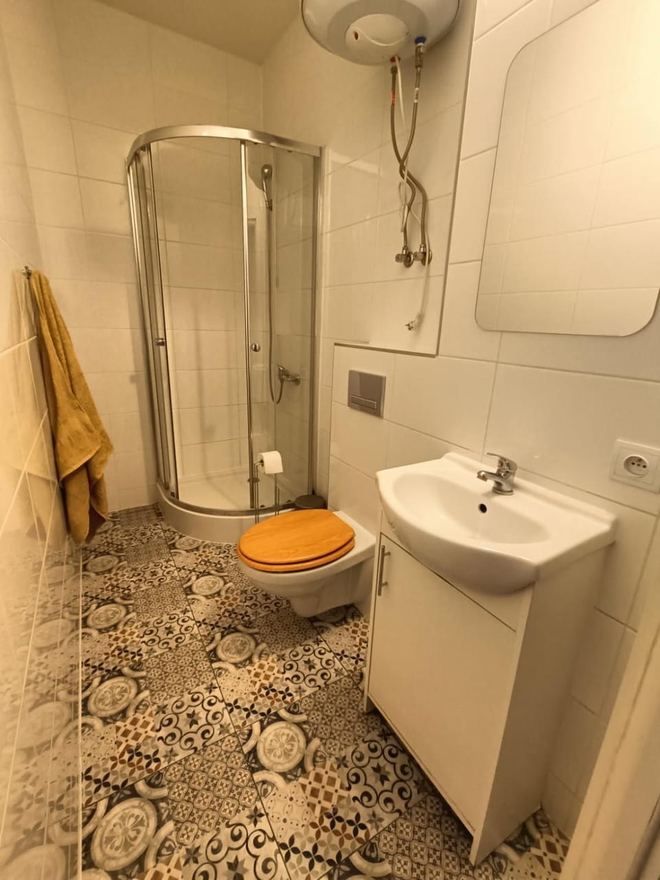 Shower, Toilet, Bathroom, hair dryier, towels