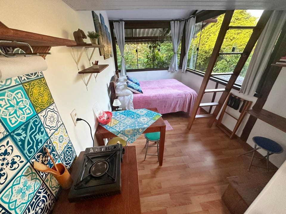 Bed, Dining area, towels, kitchen, air conditioner