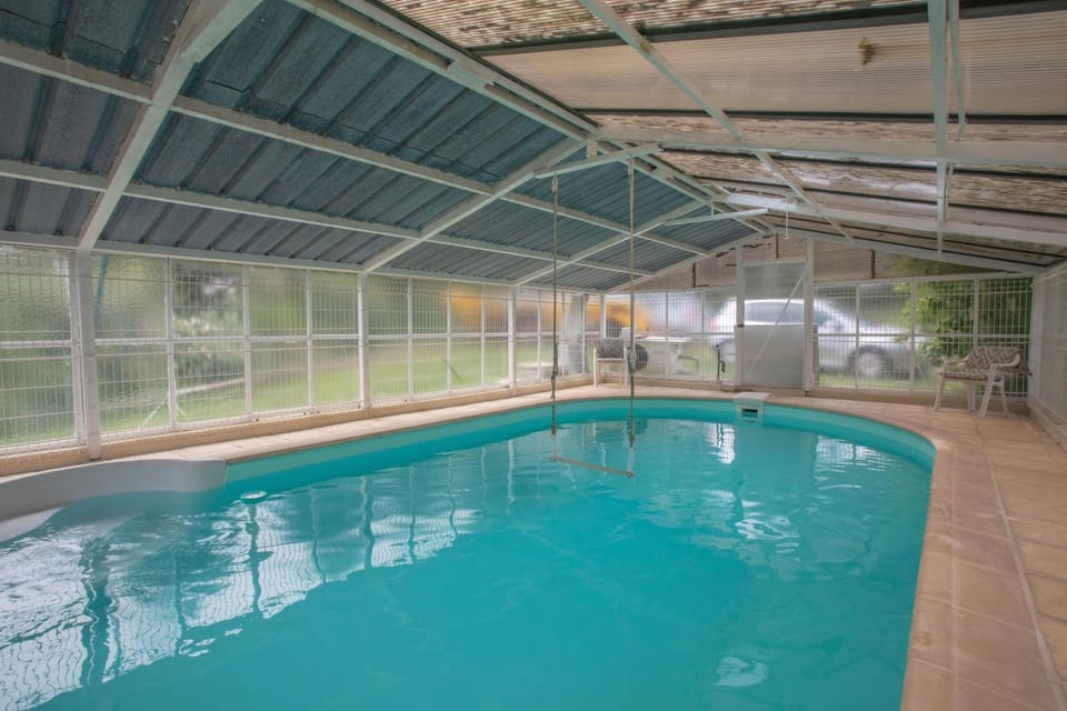 Property building, Living room, Swimming pool