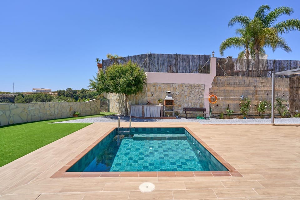Property building, Living room, Swimming pool