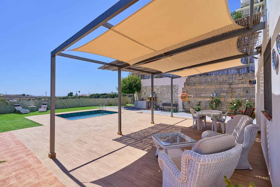 Property building, Living room, Swimming pool