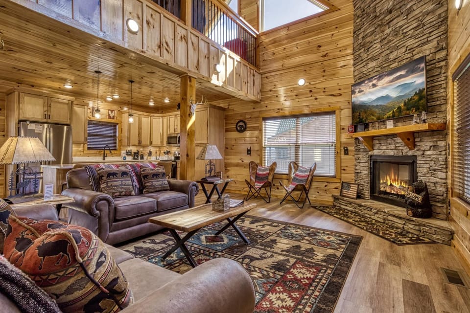 TV and multimedia, Kitchen or kitchenette, Living room, Seating area, fireplace, microwave, oven, stove