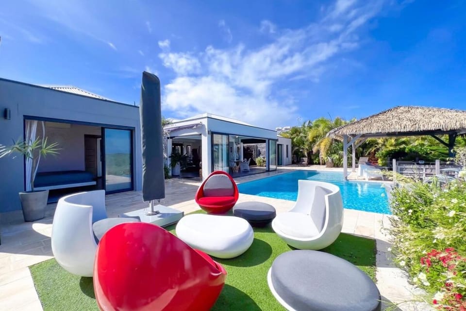Property building, Patio, Day, Natural landscape, Living room, Pool view, Swimming pool