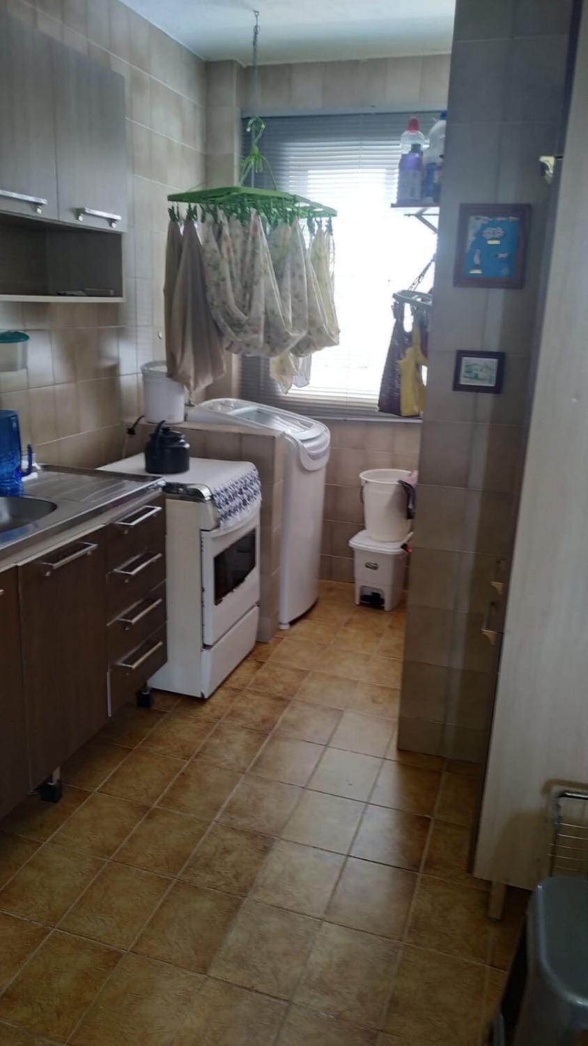 Kitchen or kitchenette, washing machine