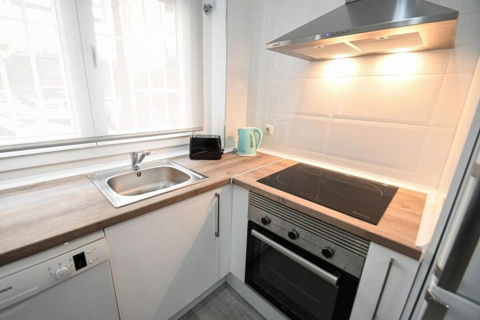 Kitchen or kitchenette, oven, stove, toaster