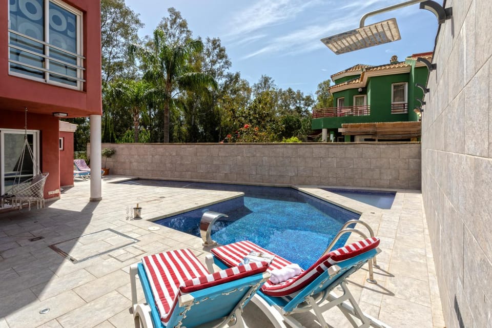 View (from property/room), Balcony/Terrace, Dining area, Swimming pool