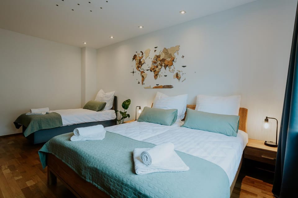 Bed, Property logo or sign, Property logo or sign, Photo of the whole room, Bedroom, Family, Family, furniture, internet, internet, towels