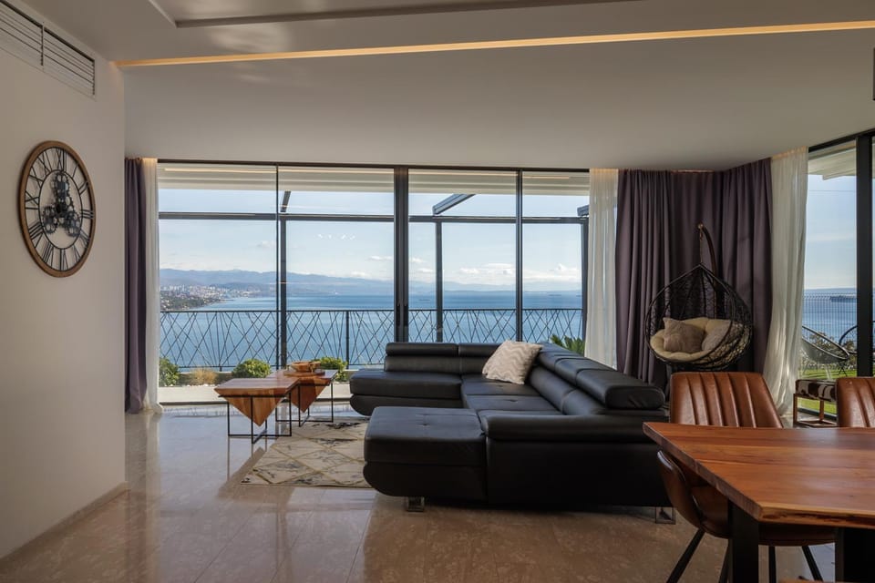 Natural landscape, Living room, Seating area, Sea view