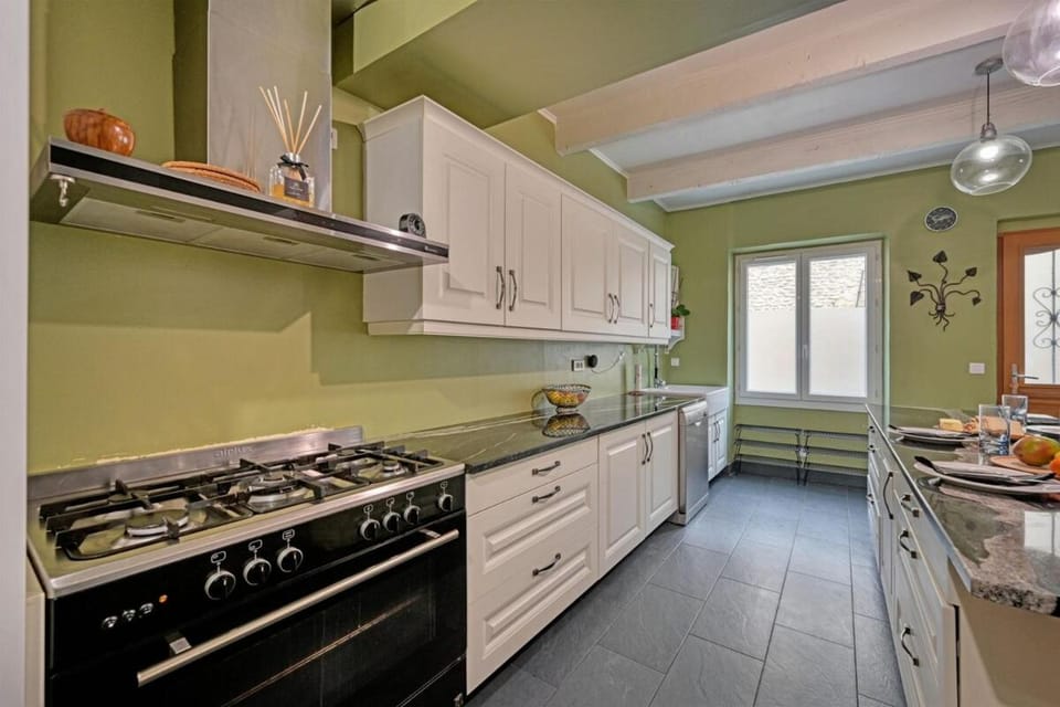 Kitchen or kitchenette, Dining area, dishwasher, stove, toaster