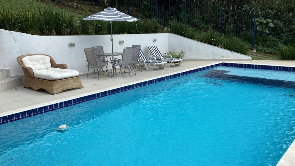 Linda casa martim de sá 5 dormitórios piscina Zara House in Caraguatatuba