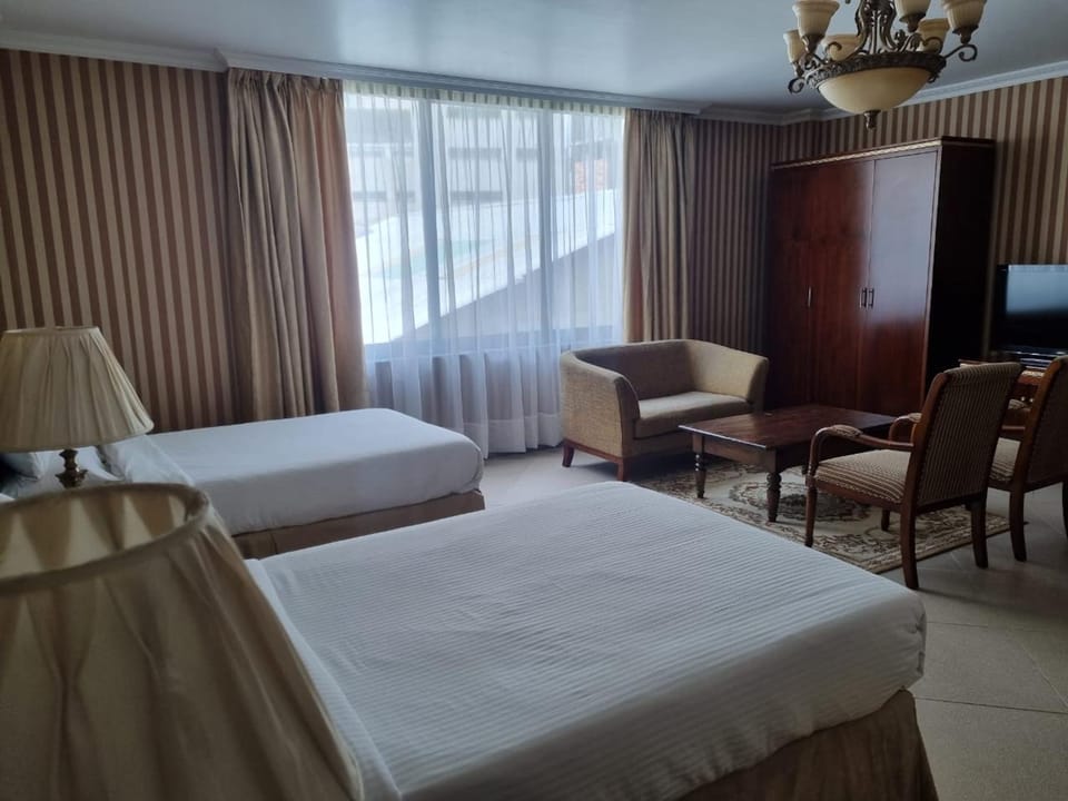 Bed, Seating area, Bedroom