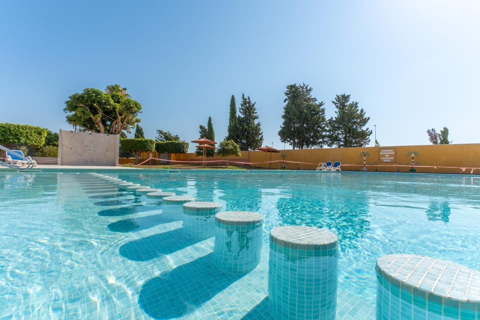 Property building, Living room, Swimming pool