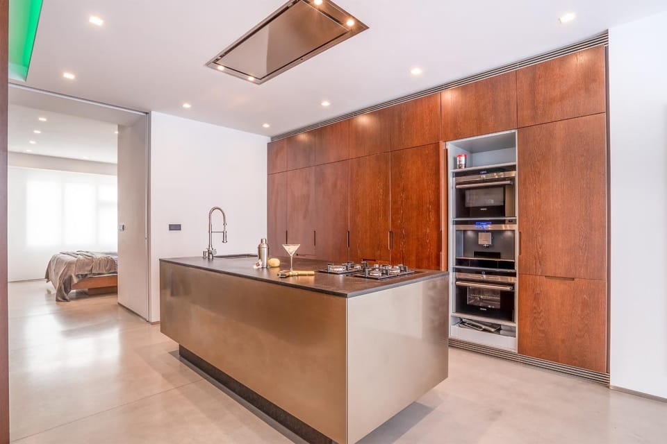 Kitchen or kitchenette, dishwasher, oven, stove