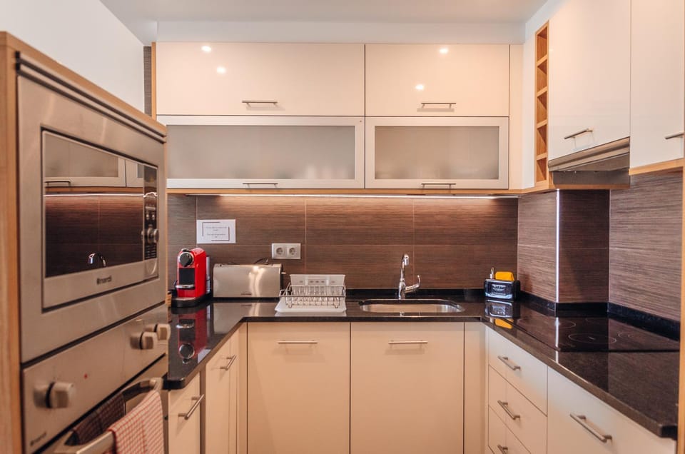 Kitchen or kitchenette, oven, stove, toaster