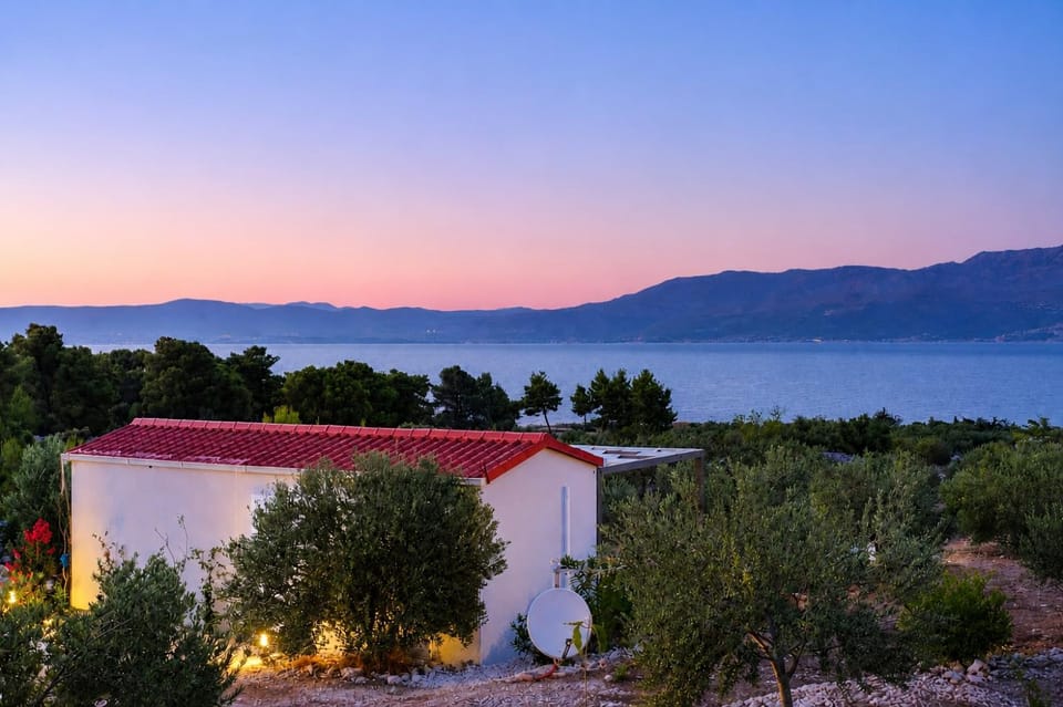 Property building, Natural landscape, Mountain view, Sea view, Sunset
