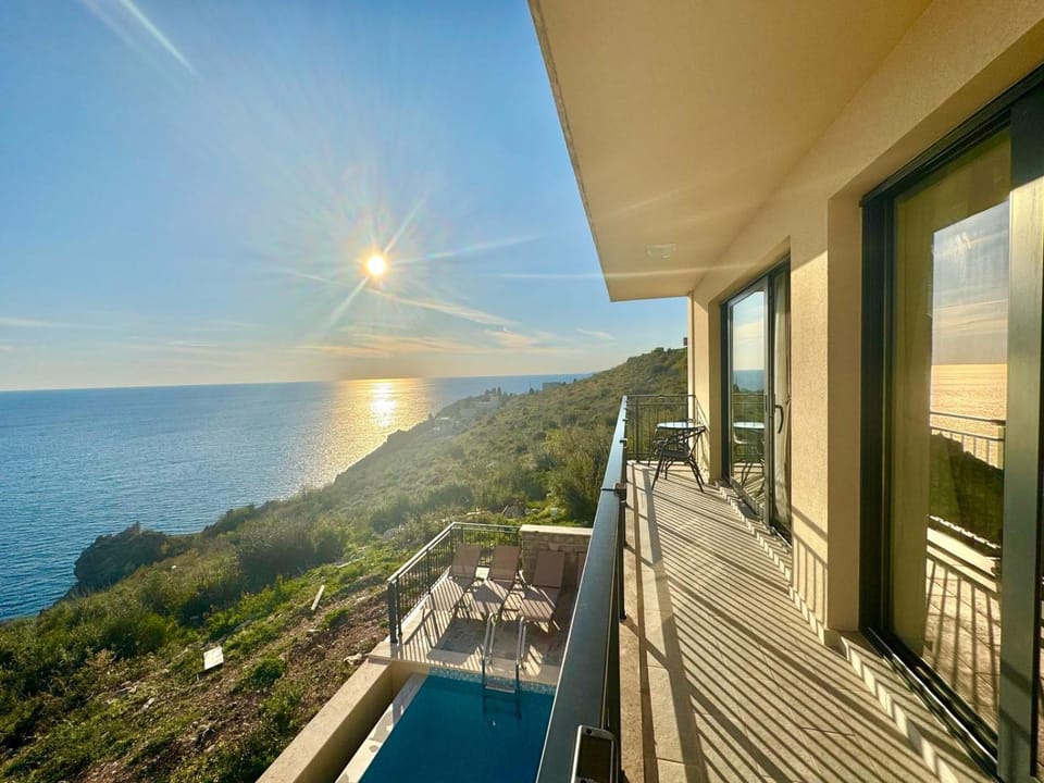View (from property/room), Balcony/Terrace, Mountain view, Pool view, Sea view, Swimming pool