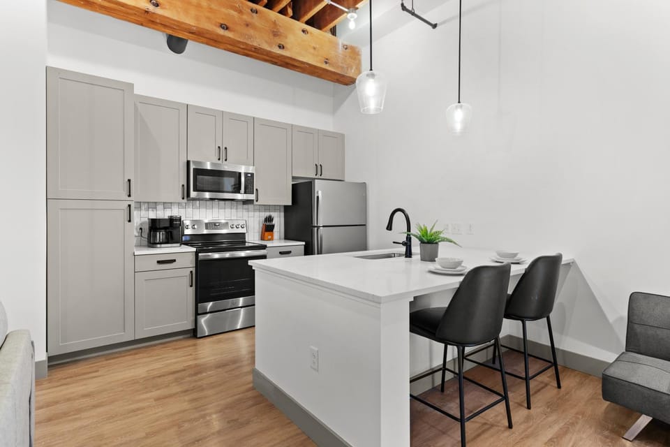 Coffee/tea facilities, Kitchen or kitchenette, Living room, Dining area, dishwasher, oven, stove, toaster