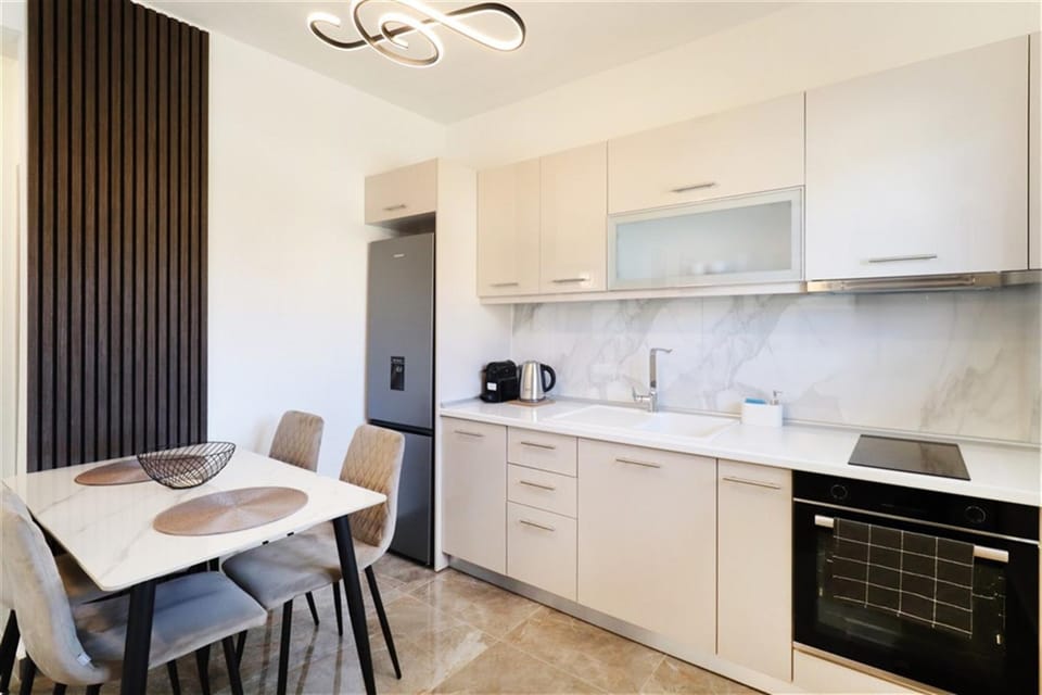 Dining area, dishwasher, oven, stove