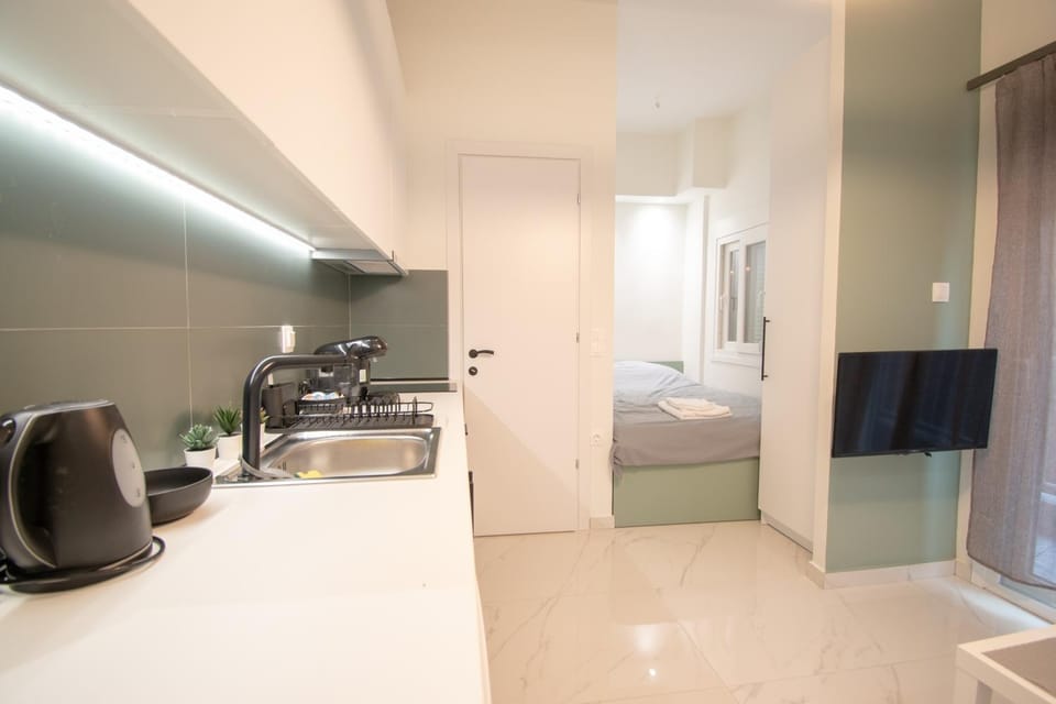 Kitchen or kitchenette, Seating area, Bedroom