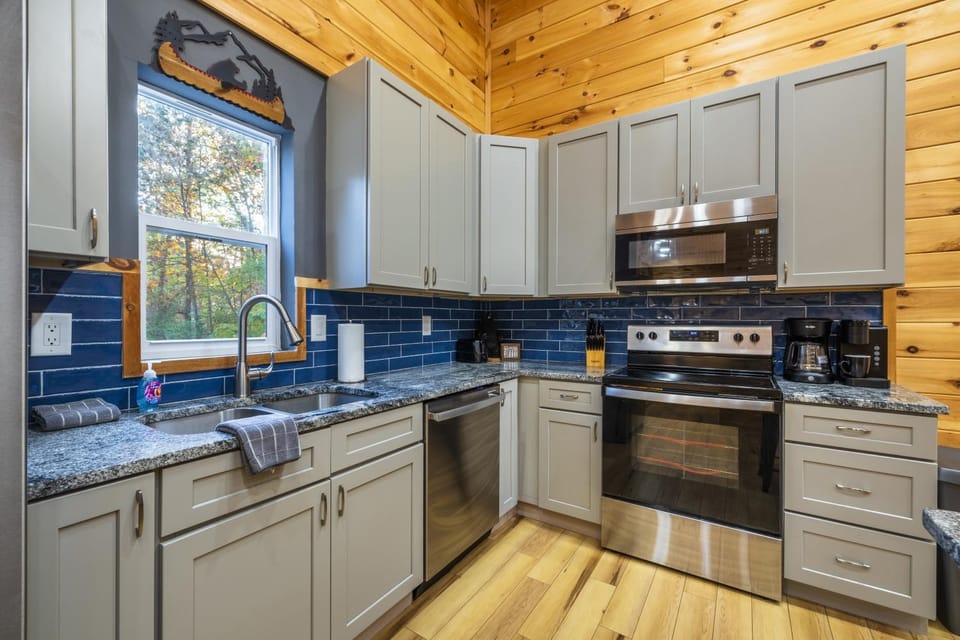 Kitchen or kitchenette, dishwasher, oven, stove, kitchen
