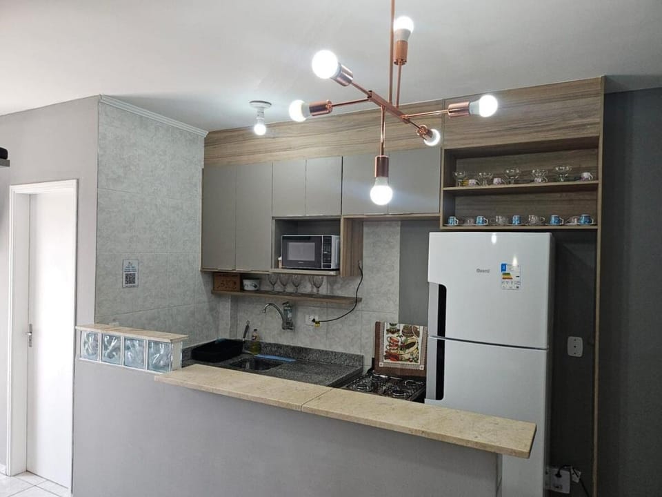 Kitchen or kitchenette, oven, stove