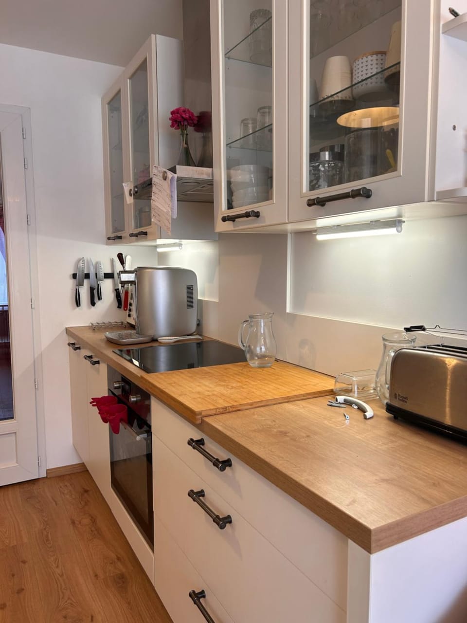 Kitchen or kitchenette, dishwasher, oven, stove, toaster