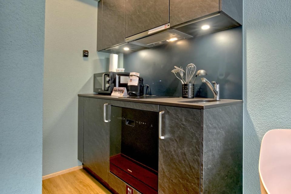 Kitchen or kitchenette, stove