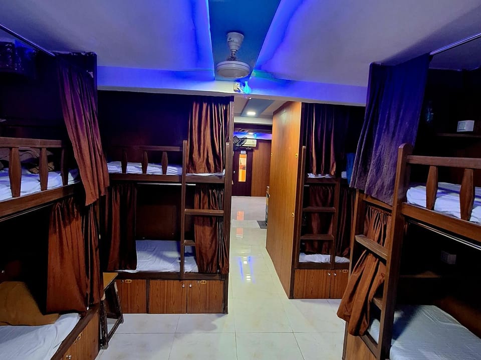 Neon Nest Dormitory Suits Asalpha Metro Hostel in Mumbai