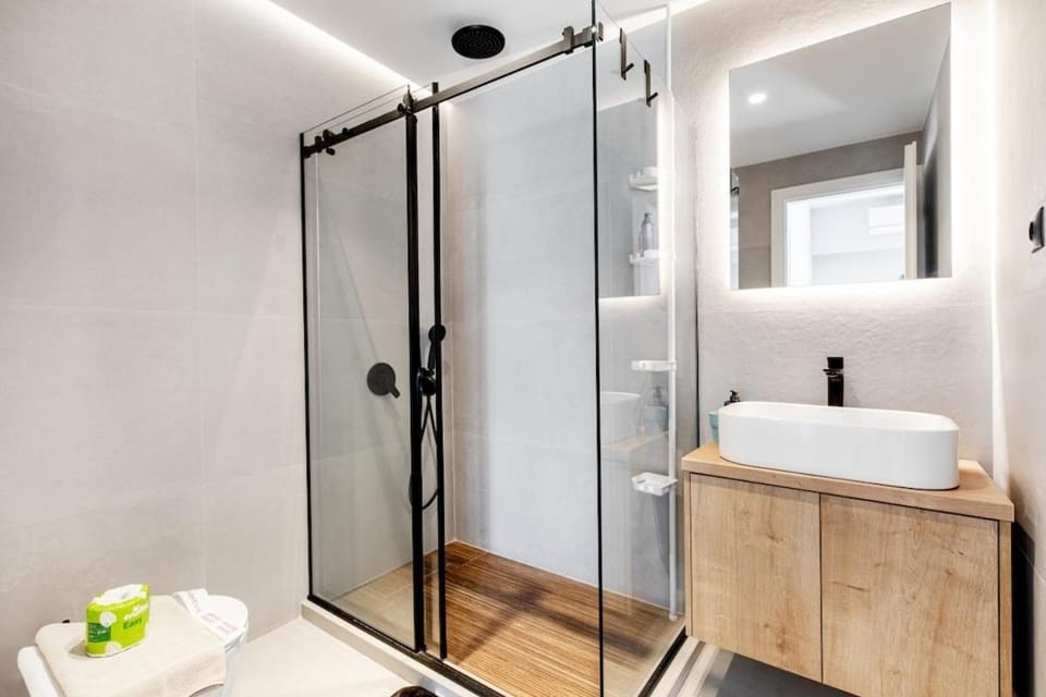 Shower, Toilet, Bathroom, hair dryier, towels