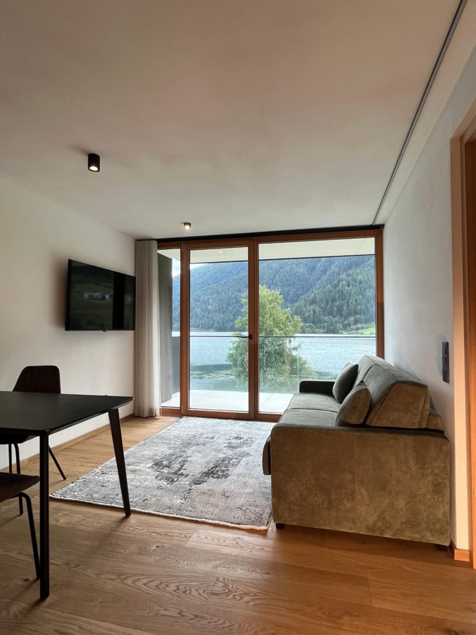 TV and multimedia, Living room, Seating area, Lake view, Mountain view