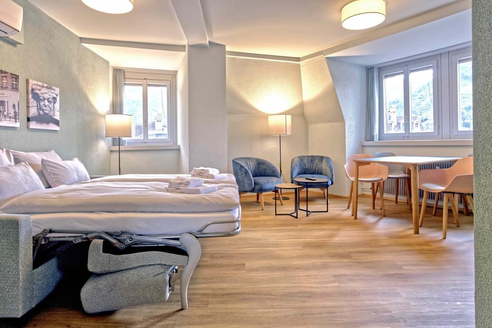 Bed, Living room, Seating area