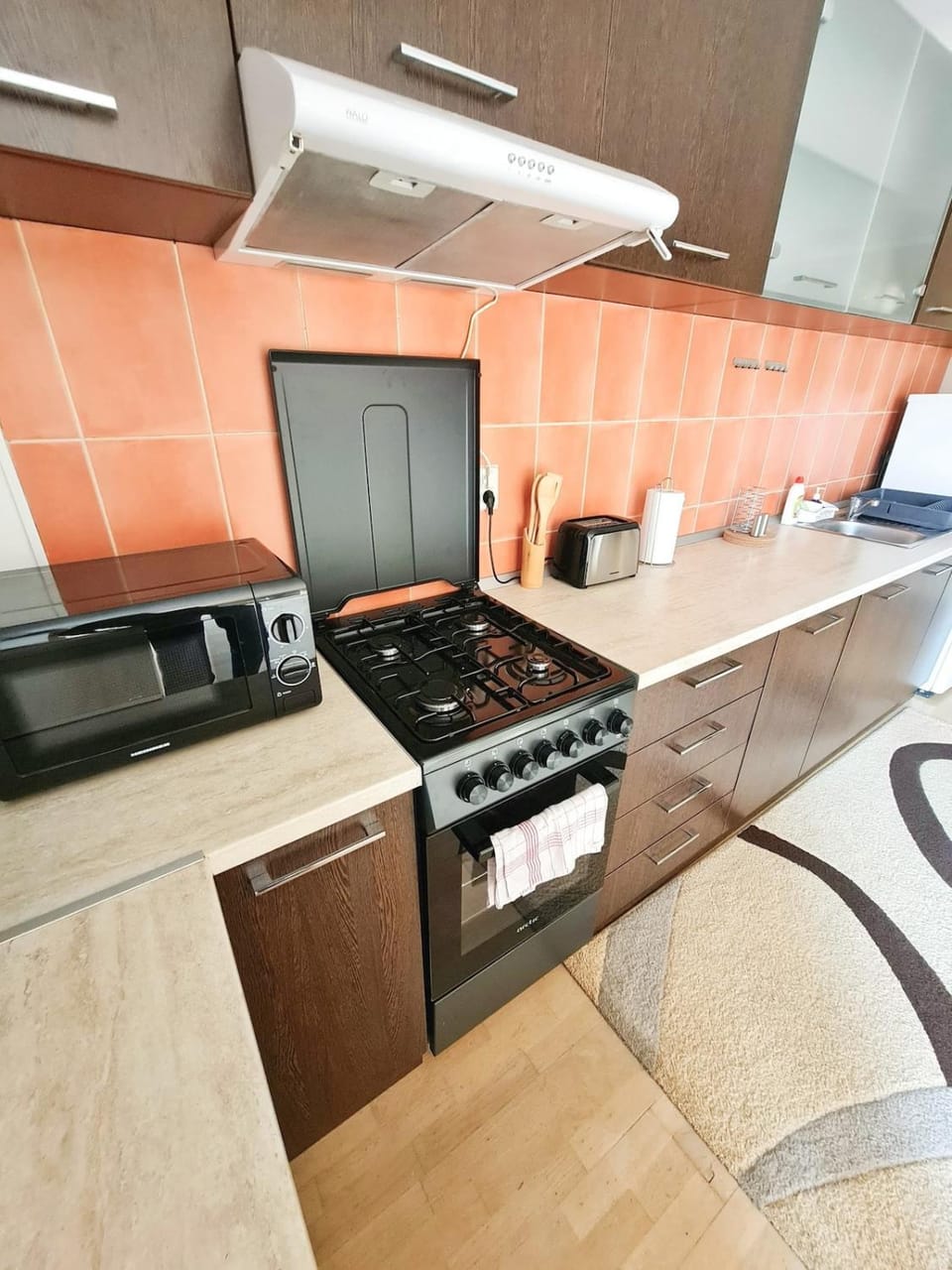 Kitchen or kitchenette, stove, toaster
