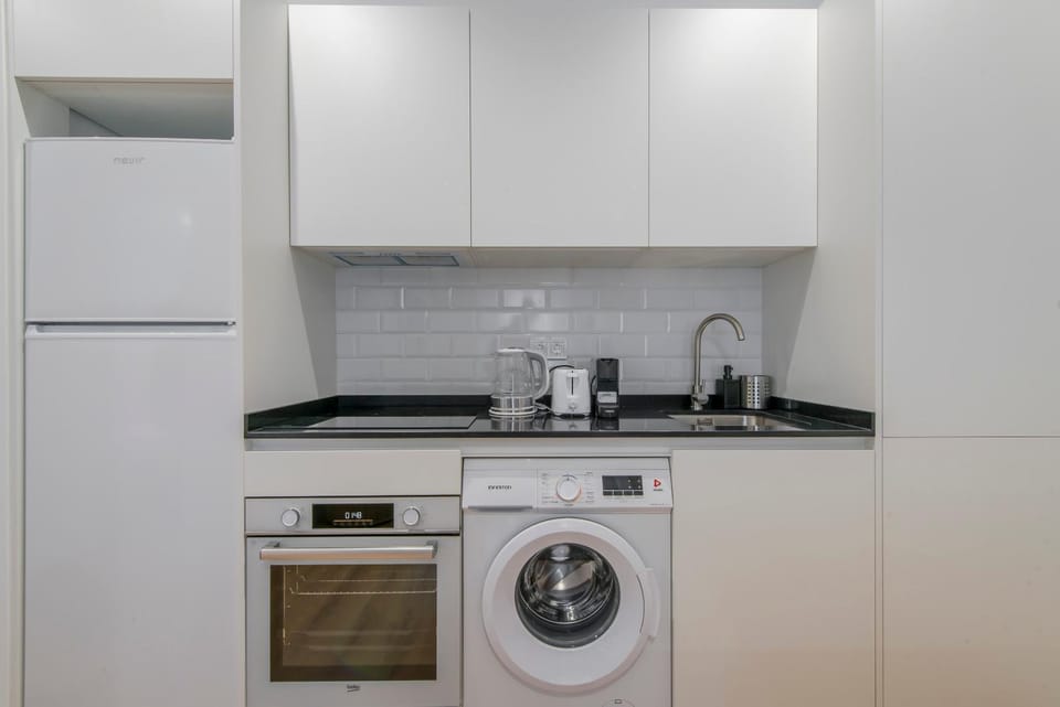 Kitchen or kitchenette, washing machine
