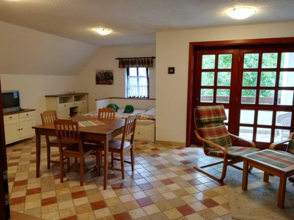 Bed, Living room, Seating area, Dining area