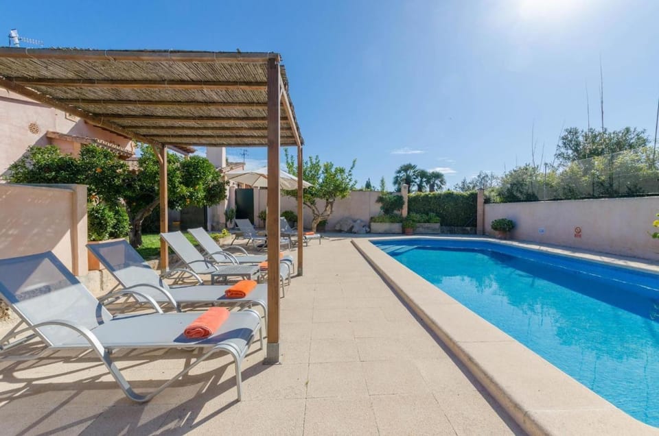 Property building, Living room, Swimming pool