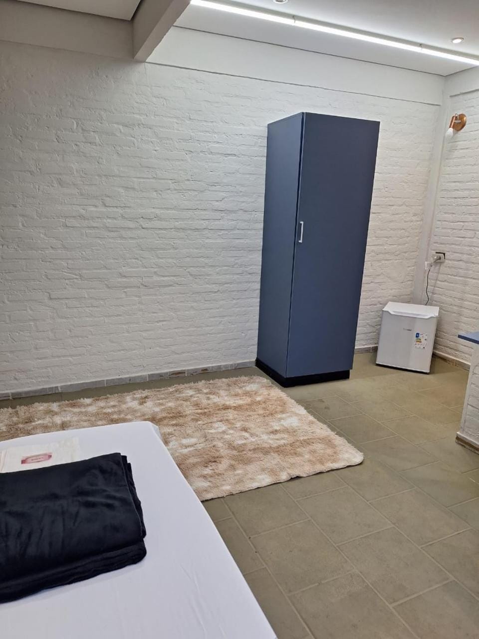minibar, towels, wardrobe