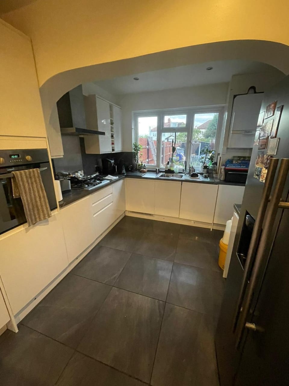 Kitchen or kitchenette, dishwasher, oven, stove