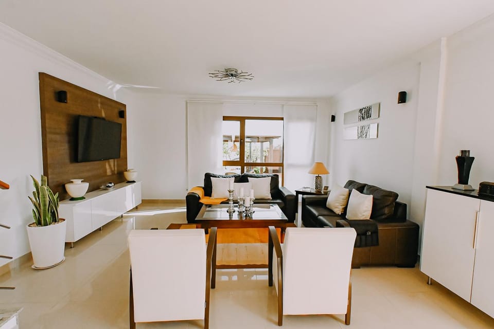 Property building, Living room, Pool view