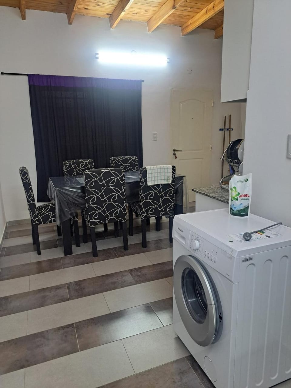 Kitchen or kitchenette, washing machine