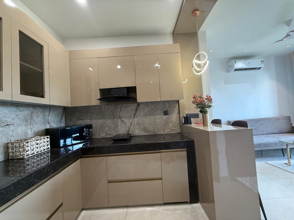 Kitchen or kitchenette, dishwasher, air conditioner