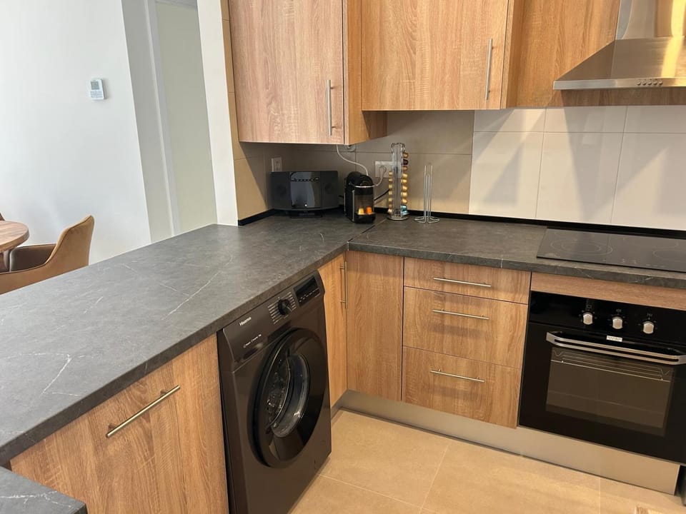 Kitchen or kitchenette, washing machine