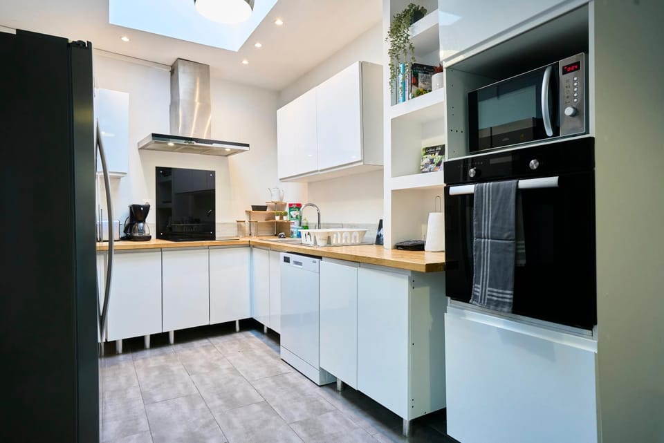 Kitchen or kitchenette, dishwasher, oven, stove, toaster